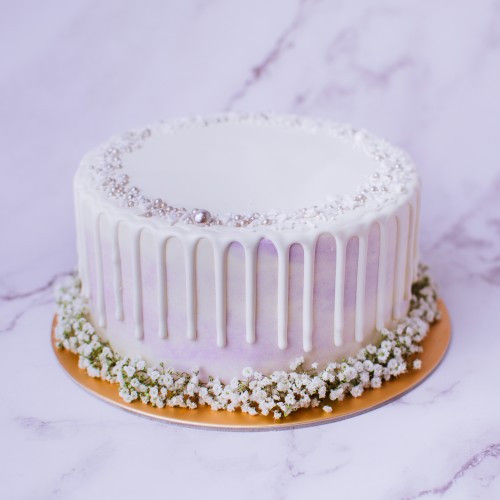 Marbled Cake with White Chocolate Drizzle and Baby's Breath