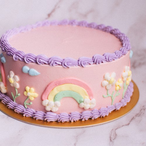 Pastel Pink Piped Rainbow and Daisies Garden Cake