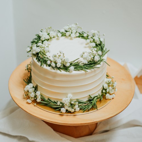 White Striped Cake with Rosemary and Baby's Breath