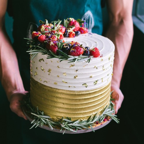 White & Gold Cake with Rosemary & Crescent Decor Berries