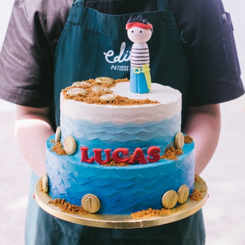 Two Tier Sky Blue Ombre Pirate Cake