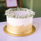 Gold Swash Cake with Baby's Breath