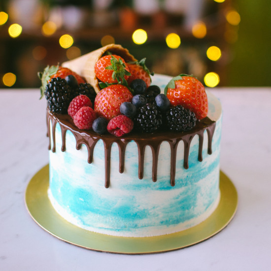 Marbled Cake with Drizzle and Cascading Berries